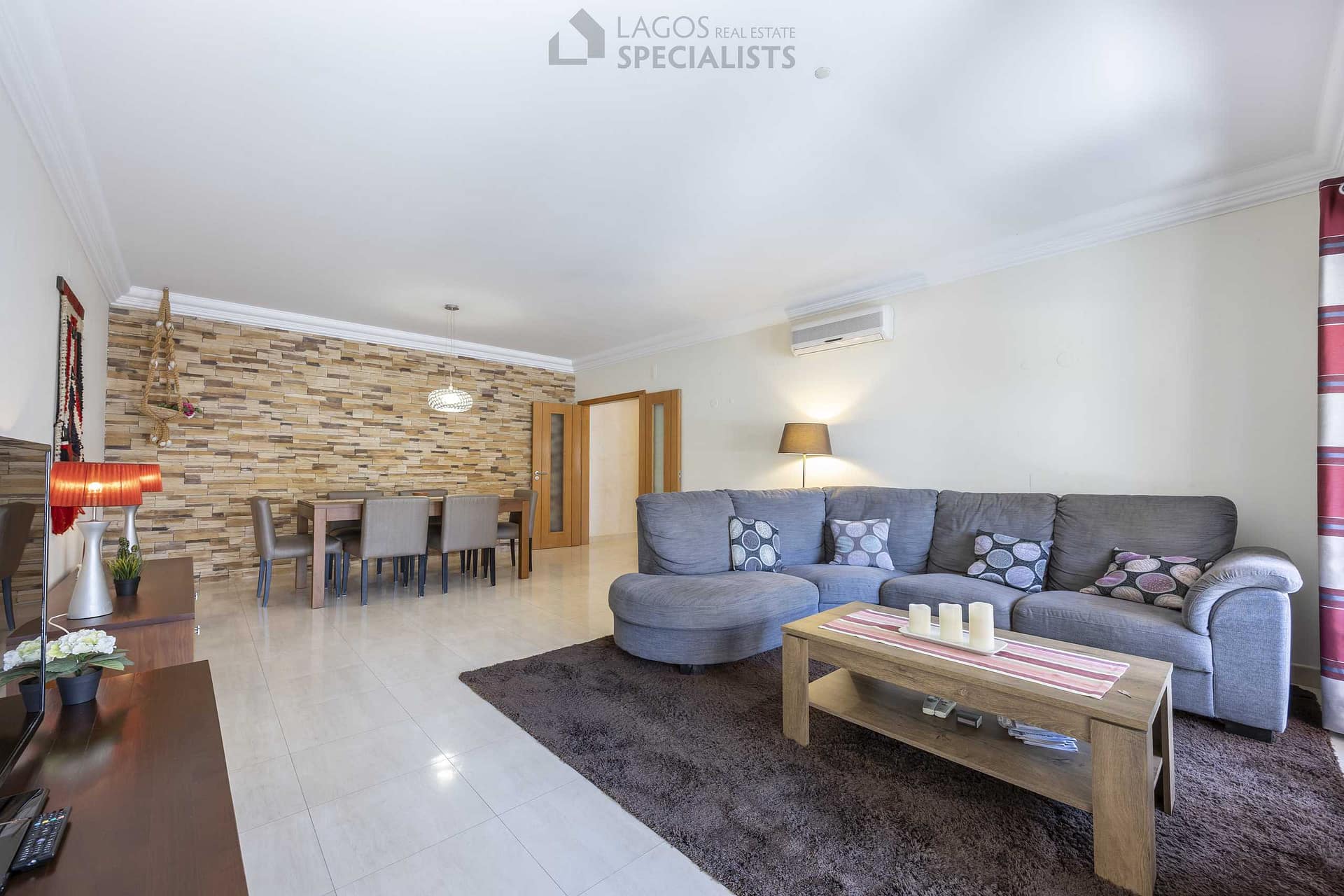 Bright living and dining room with direct access to terrace – 3-bedroom apartment in central Lagos