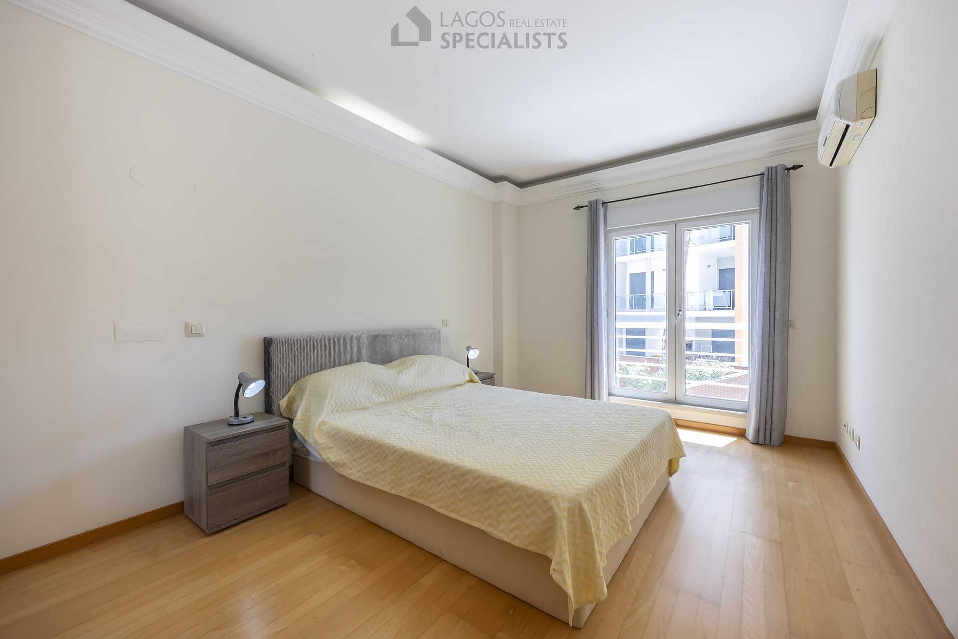 Double bedroom with built-in wardrobe and natural light