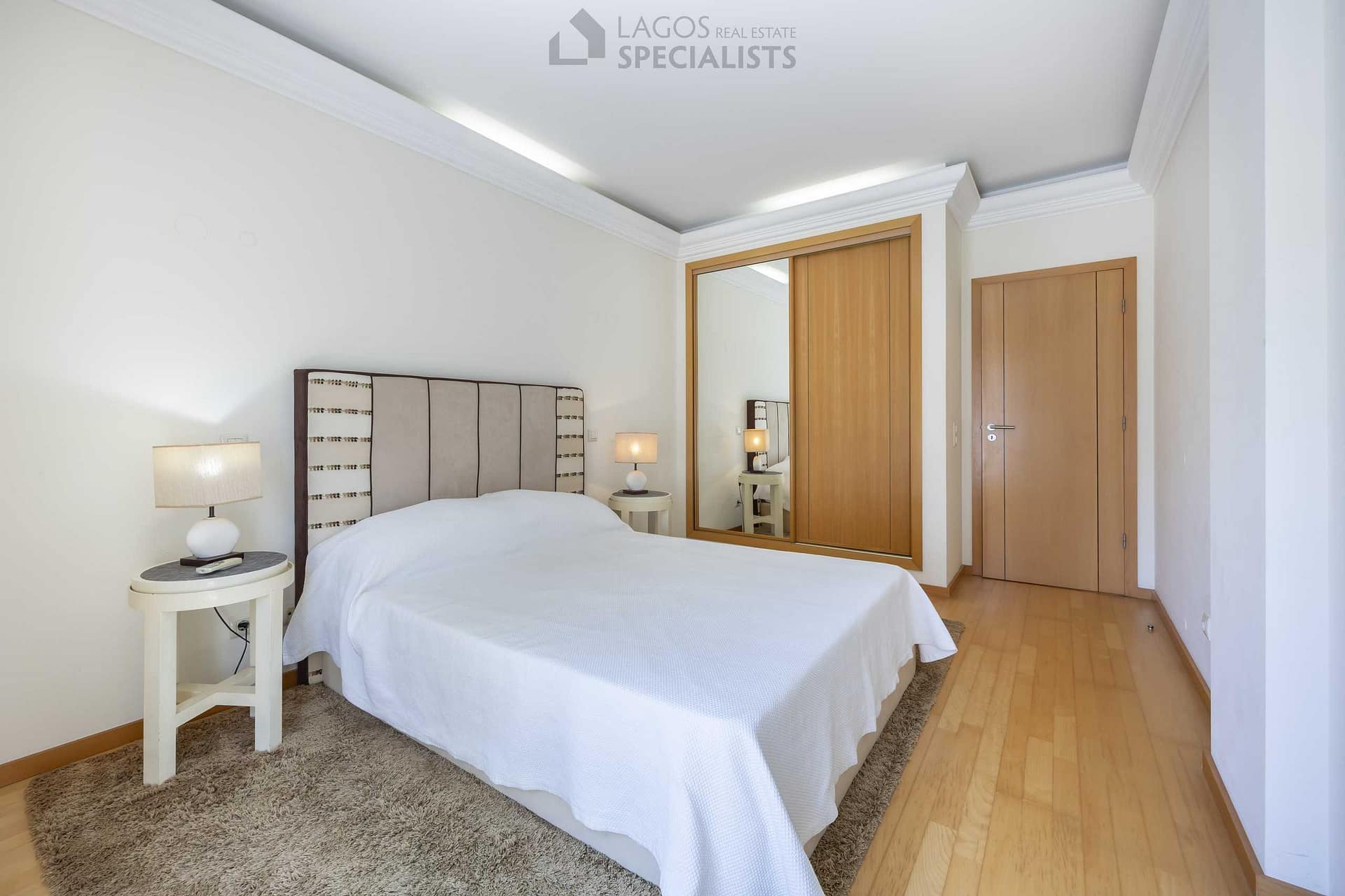 Double bedroom with built-in wardrobe and natural light