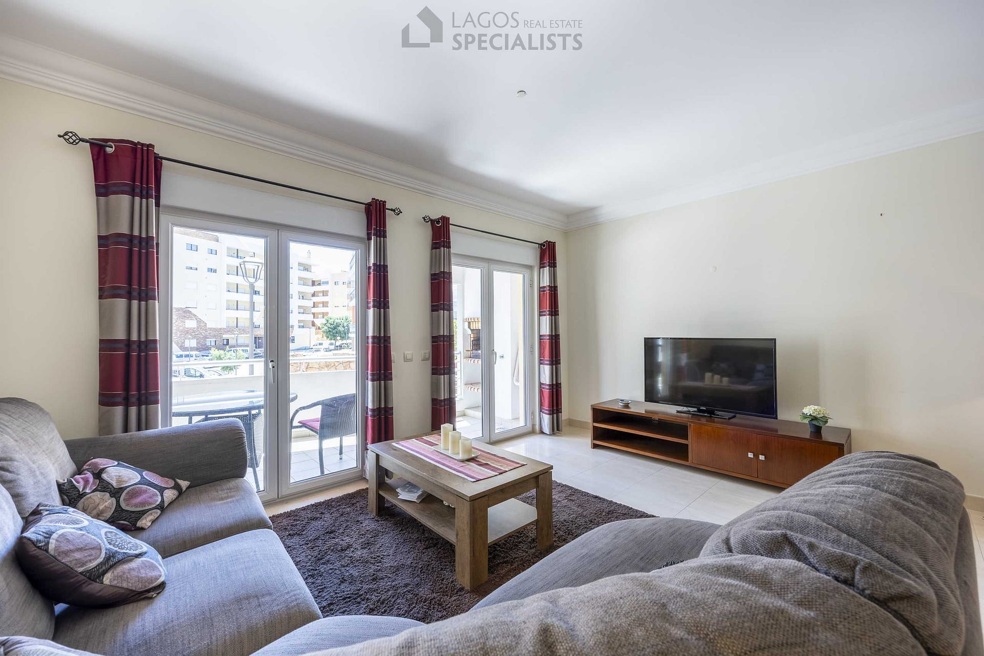 Bright living and dining room with direct access to terrace – 3-bedroom apartment in central Lagos