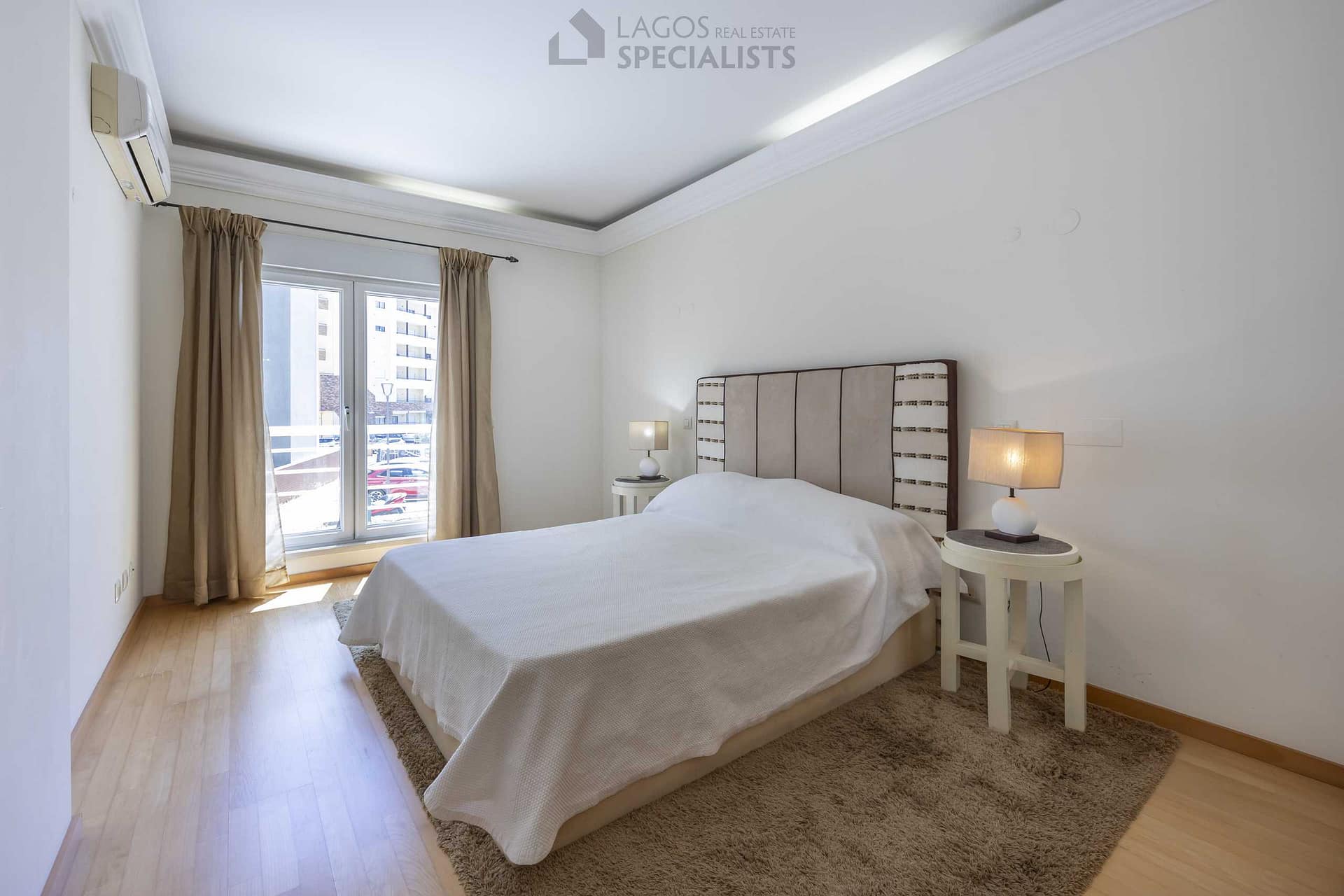 Double bedroom with built-in wardrobe and natural light
