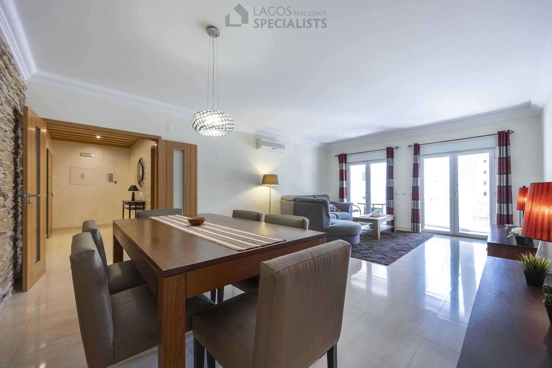 Bright living and dining room with direct access to terrace – 3-bedroom apartment in central Lagos