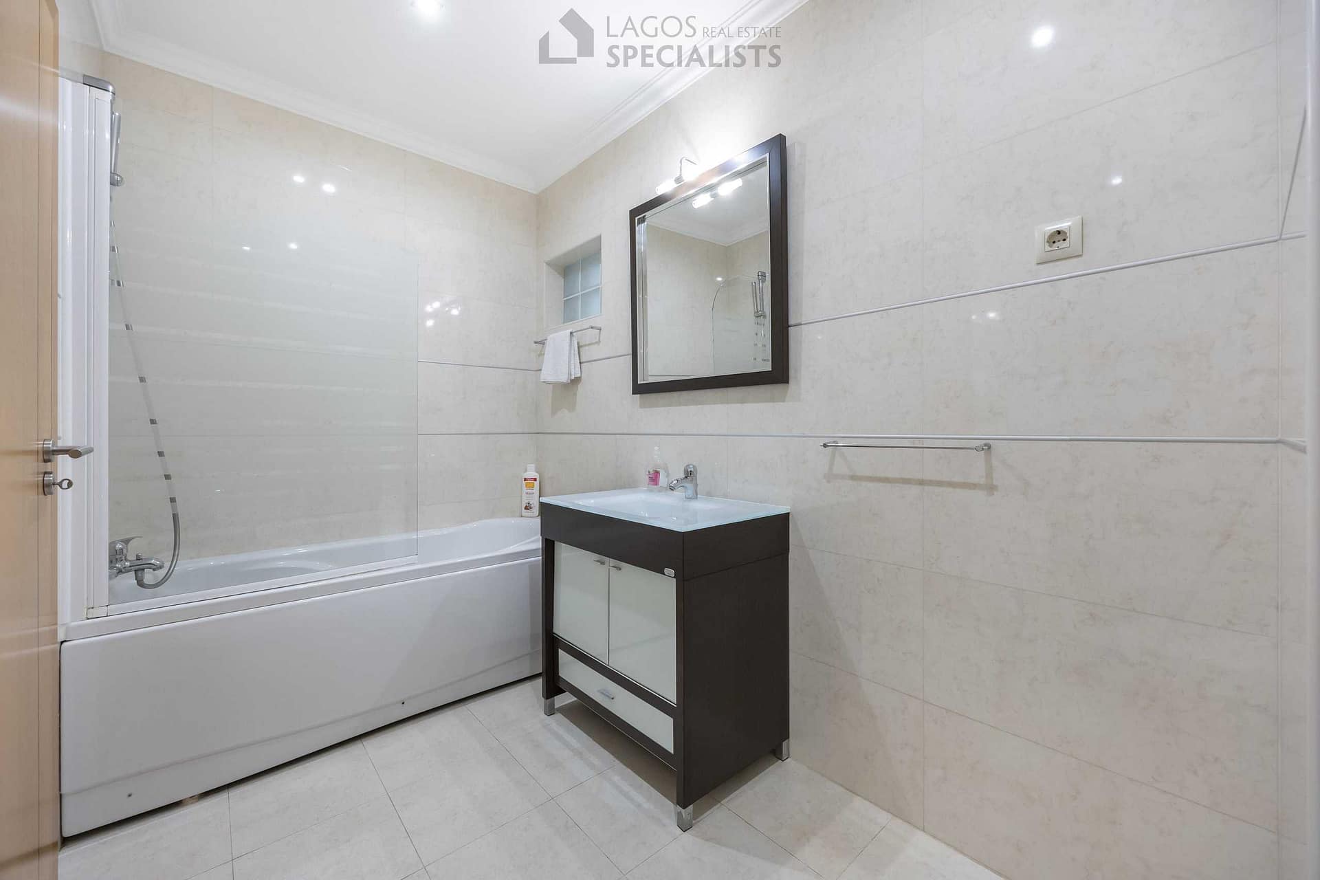 Modern bathroom with bath – Lagos apartment