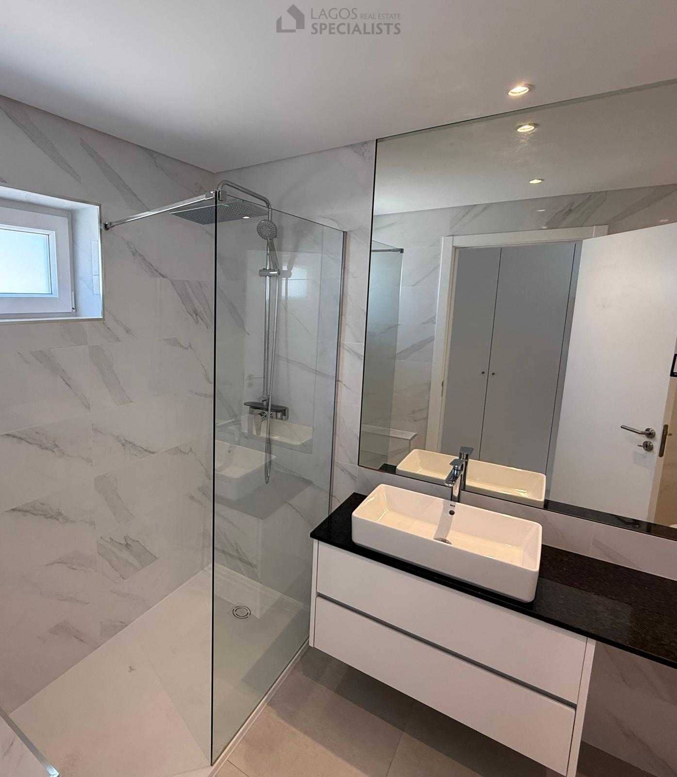 Modern bathroom with walk-in shower