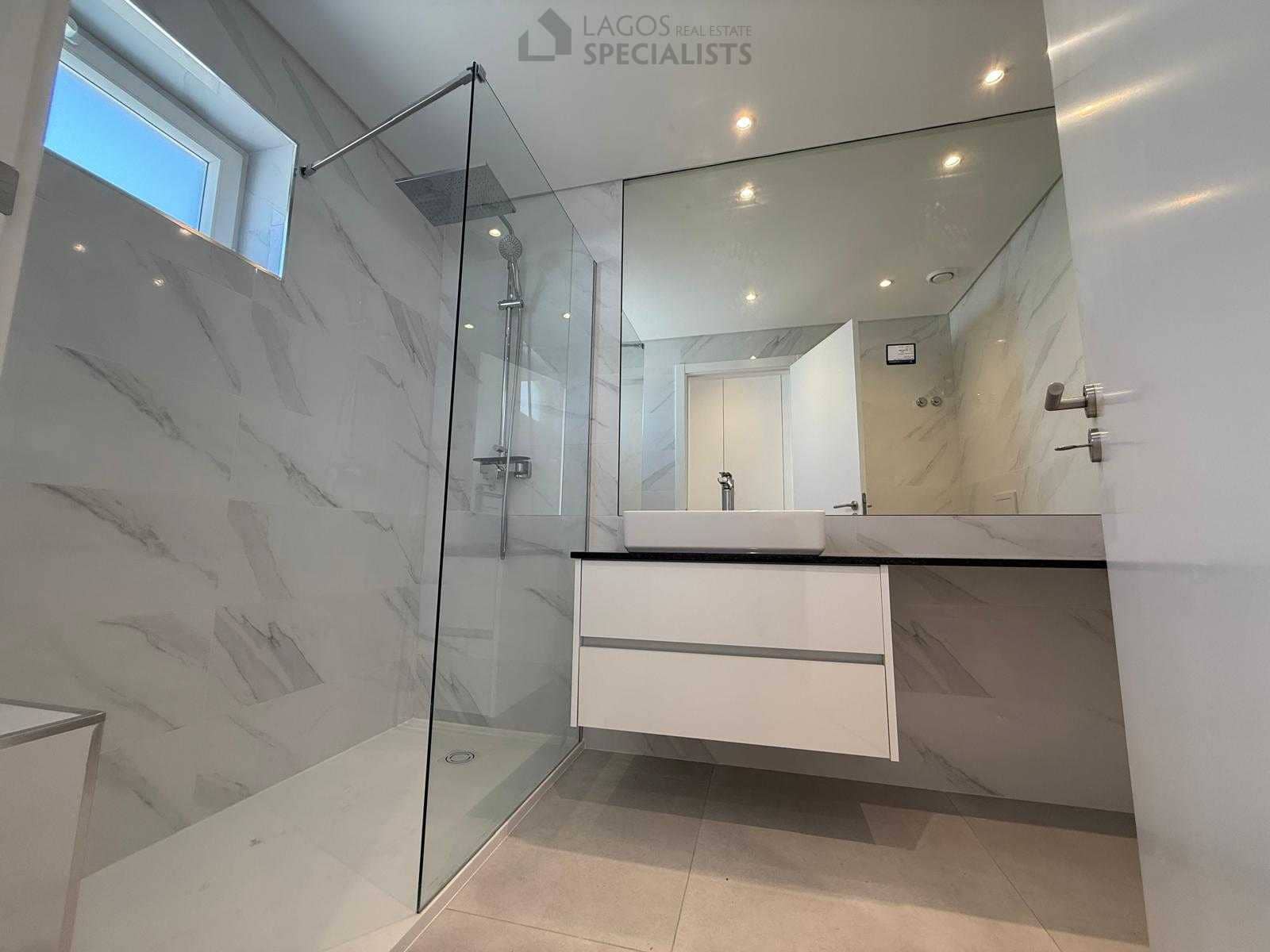 Modern bathroom with walk-in shower