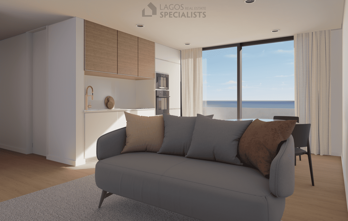 open-plan living room with sofa and Bosch kitchen in new build 1-bedroom apartment Lagos