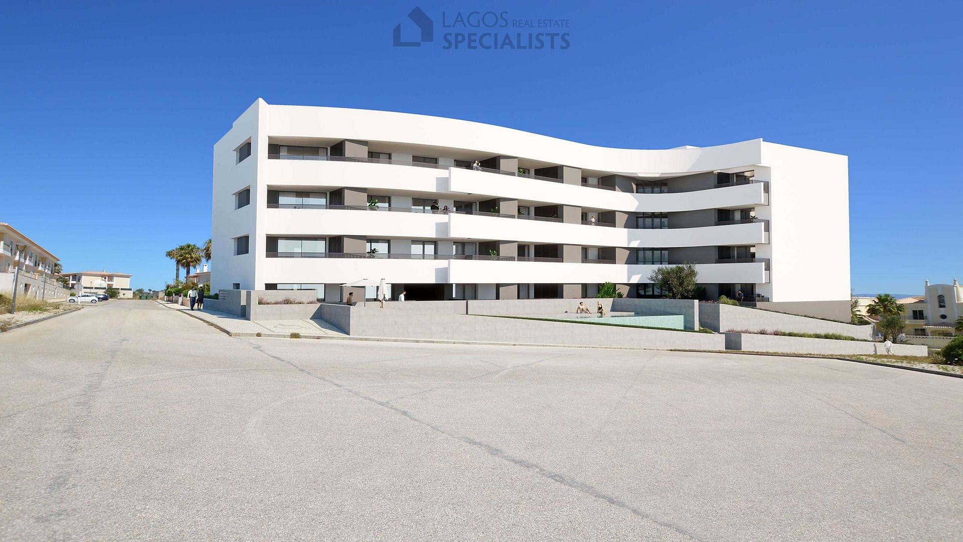 modern architecture of The Leaf apartments with pool in Porto de Mós, Lagos