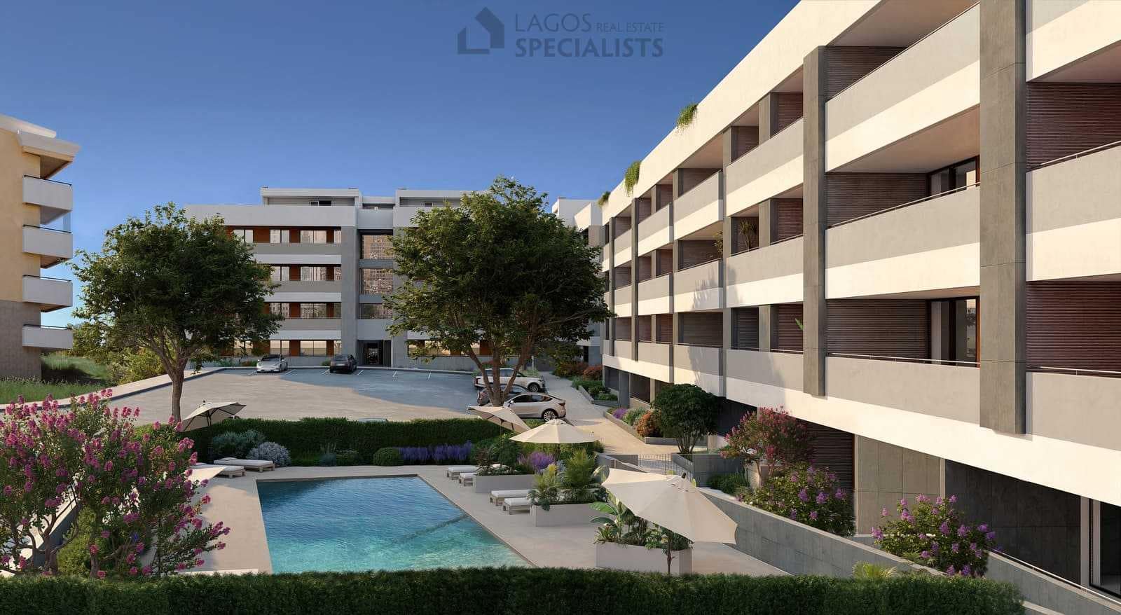 View of the Domus apartment buildings in Lagos featuring the outdoor pool area, landscaped gardens, and private parking.
