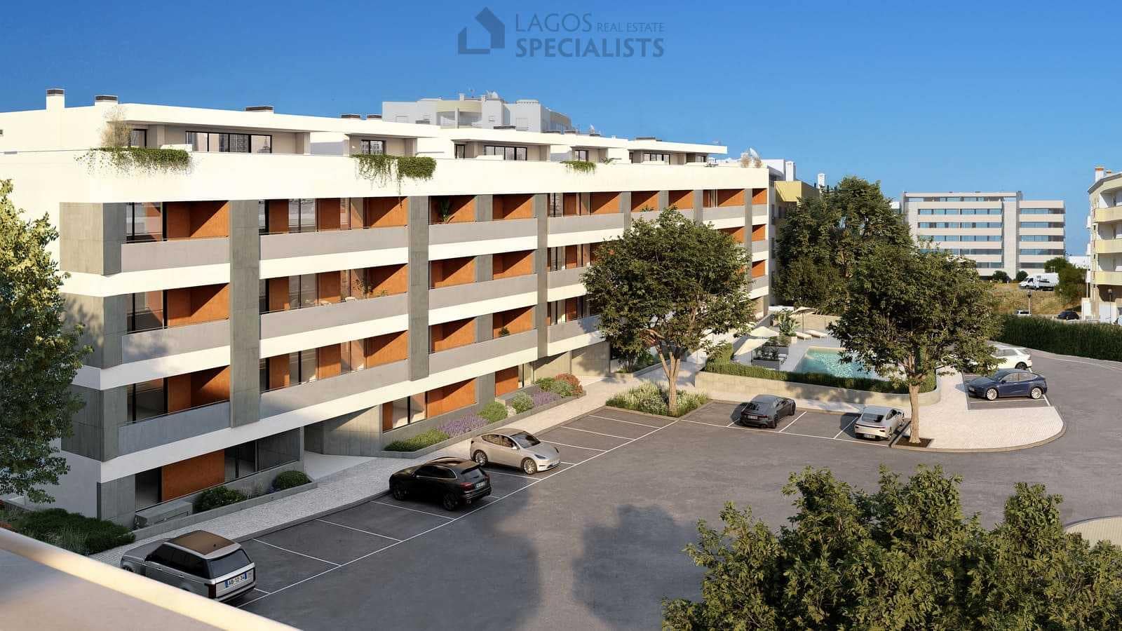 Modern facade of the Domus new-build apartments in Lagos with parking area and pool access.