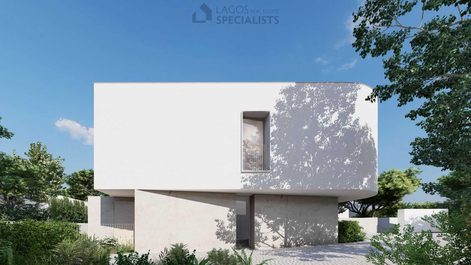 Contemporary façade with floor-to-ceiling windows and lush garden landscaping